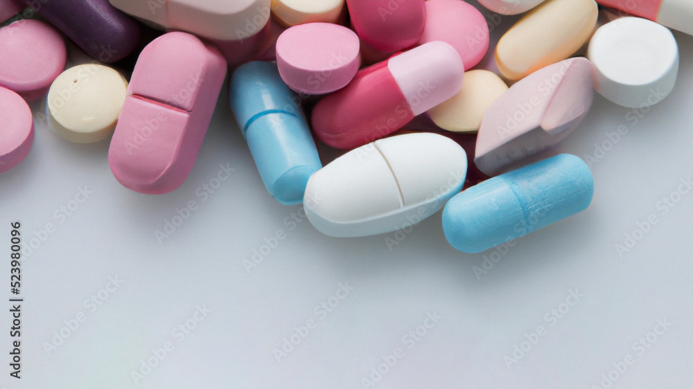 Different colored pills background, close up Different colored pills background, close up