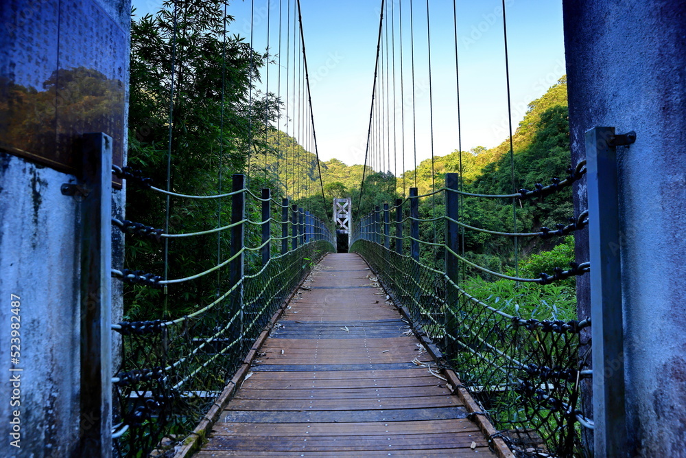 Obraz premium Huliaotan Suspension Bridge at peishih river in Pinglin Taipei, Taiwan