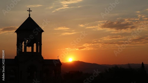 Time lapse of the church during evening. photo