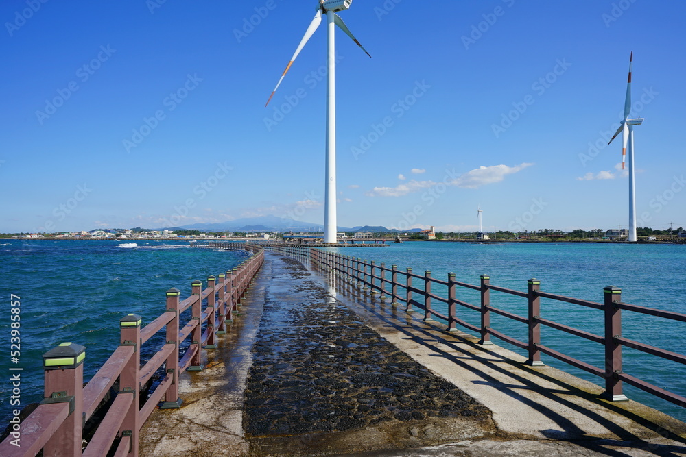 Fototapeta premium turbine and bridge on the sea