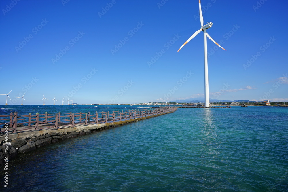 turbine and bridge on the sea