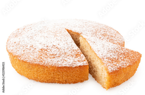 Wall Mural Whole lemon sponge cake with icing sugar topping and cut out wedge isolated on white