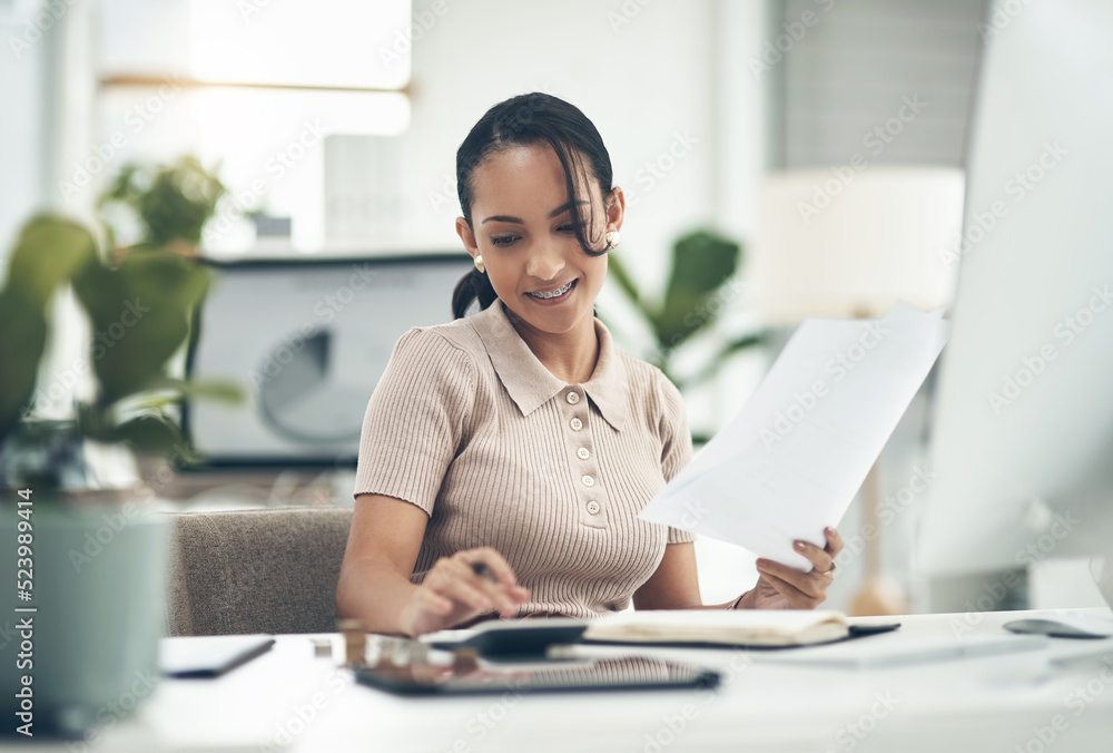 Young, professional and working woman using a calculator to calculate company budget, finances or business expenses. Admin female doing financial planning, banking audit or processing documents. Young, professional and working woman using a calculator to calculate company budget, finances or business expenses. Admin female doing financial planning, banking audit or processing documents.