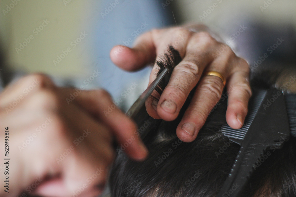 Obraz premium hairdresser with scissors 