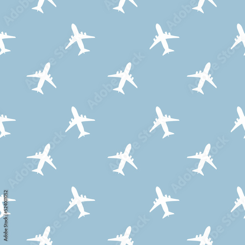Kids seamless pattern with airplanes white. Blue background. Baby pattern.