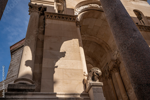 Roman Arch, Gargoyle, Shadows, Pillar, Split Croatia photo