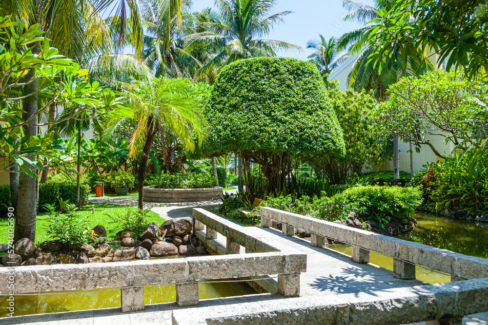 Rest on the shores of the Pacific Ocean in a comfortable luxury hotel. Walk on the bridge over the fish pond