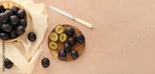 Composition with ripe plums...