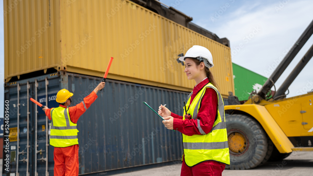 Woman inspector foreman Checking Cargo in Container cargo CustomTerminal port, Foerman use Clipboard paper for checking cargo concept  import export transportation and logistic insurance service