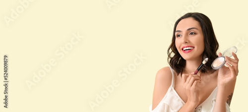 Beautiful young woman apply...