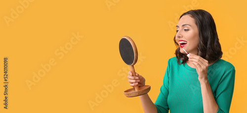 Beautiful young woman apply...