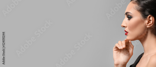 Beautiful young woman with ...