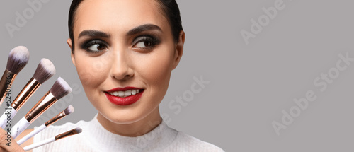 Beautiful young woman with ...