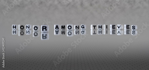 Obraz na plátně honor among thieves word or concept represented by black and white letter cubes