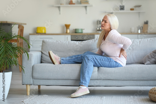 Mature woman suffering from...