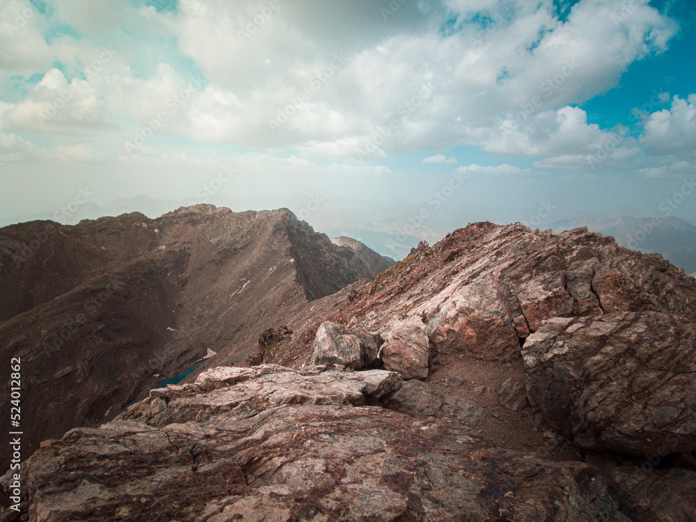 Aerial mountain photography from a drone of peaks such as Los Infernos, Ibon de Pondiellos, a incredible trekking day from the Garmo Negro peak in Panticosa, Pyrenees of Aragon, Spain.