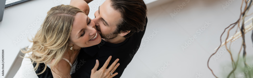 Overhead view of smiling woman dancing with elegant boyfriend in restaurant, banner. Overhead view of smiling woman dancing with elegant boyfriend in restaurant, banner.