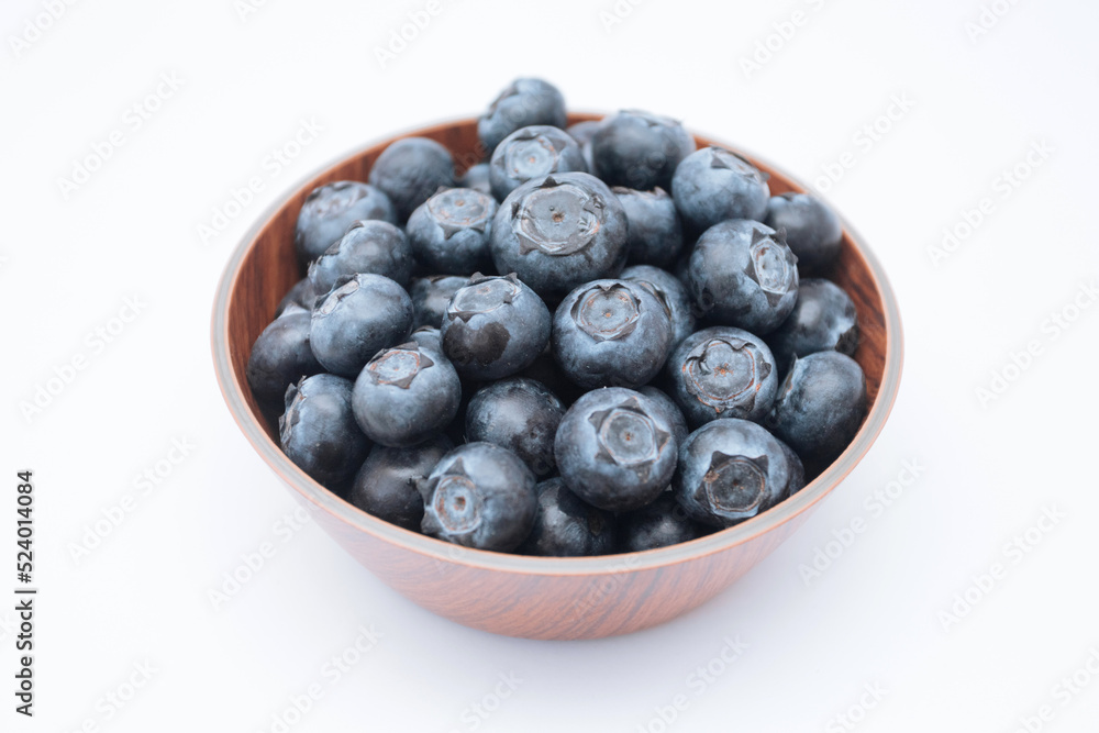 Blueberries in a bowl on white background Blueberries in a bowl on white background
