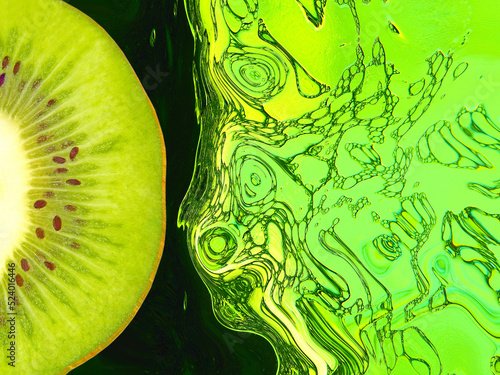 Half of ripe green kiwi slice on green abstract liquid background.
