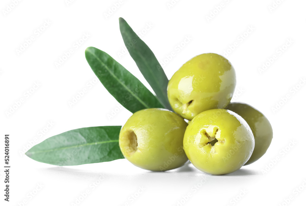 Delicious green olives with leaves on white background