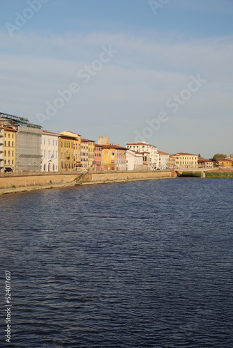 Old houses at the Arno river in Pisa, Italy