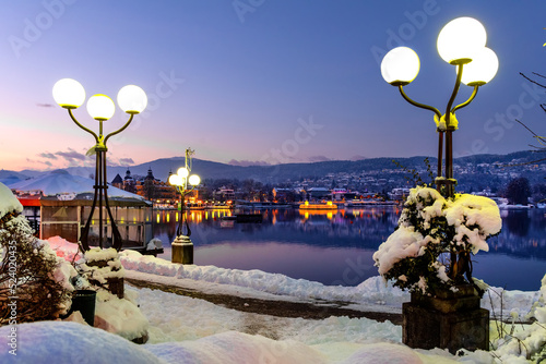 Velden, Lake Wörthersee, Austria. Advent wreath on the lake at night. Velden, Wörthersee, Austria. Adventskranz auf dem See bei Nacht photo