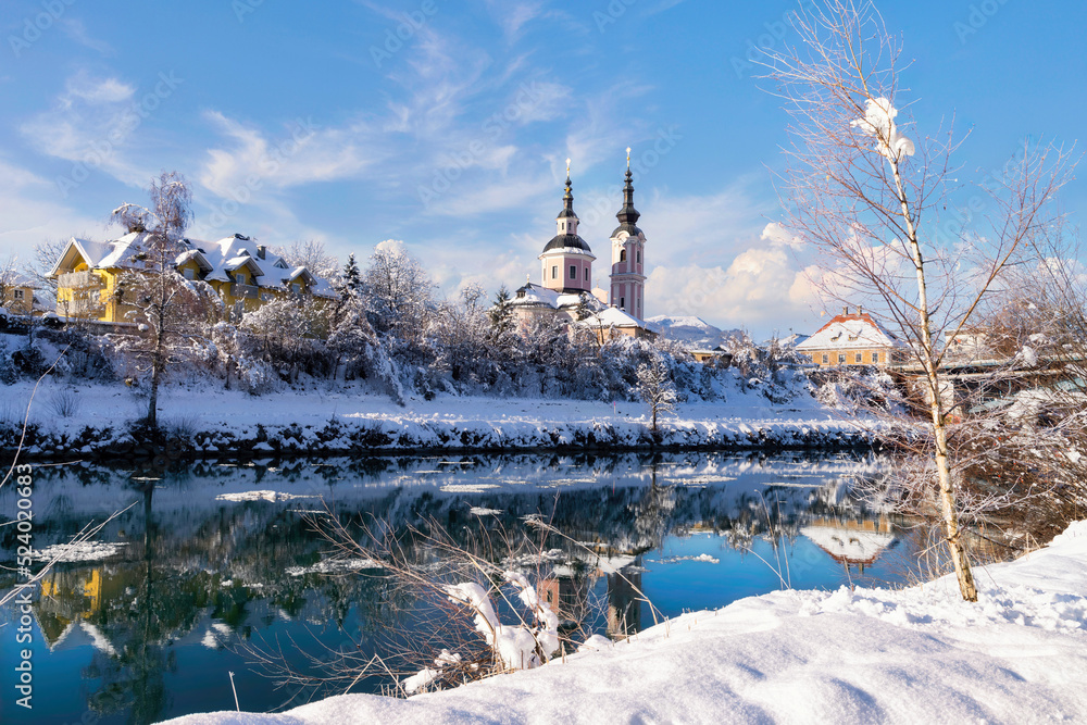 Villach, Austria. Idyllic view of the Church of the Holy Cross (Heiligenkreuzkirche ) in winter