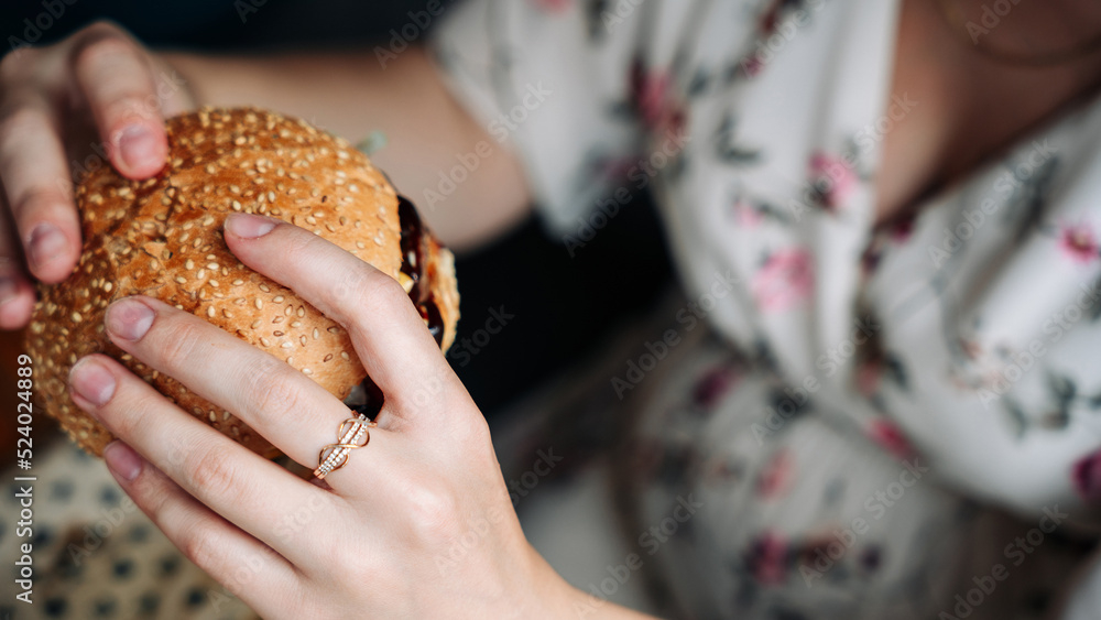 Pregnancy woman burger eating. Hungry pregnant girl biting hamburger. Fast food, people and