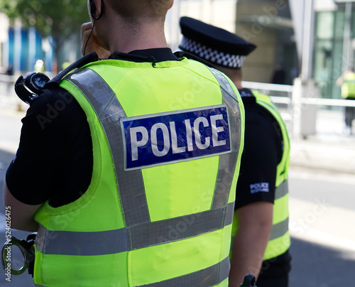 Photography Police officer on duty on a city centre street during special event