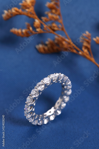 Diamond engagement ring isolated on creative paper background ,Diamond ting for women 