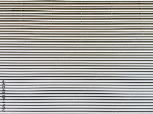 Wall panel texture in the form of a metal grid, used to cover rooms that need air ventilation, HVAC and technical rooms in buildings
