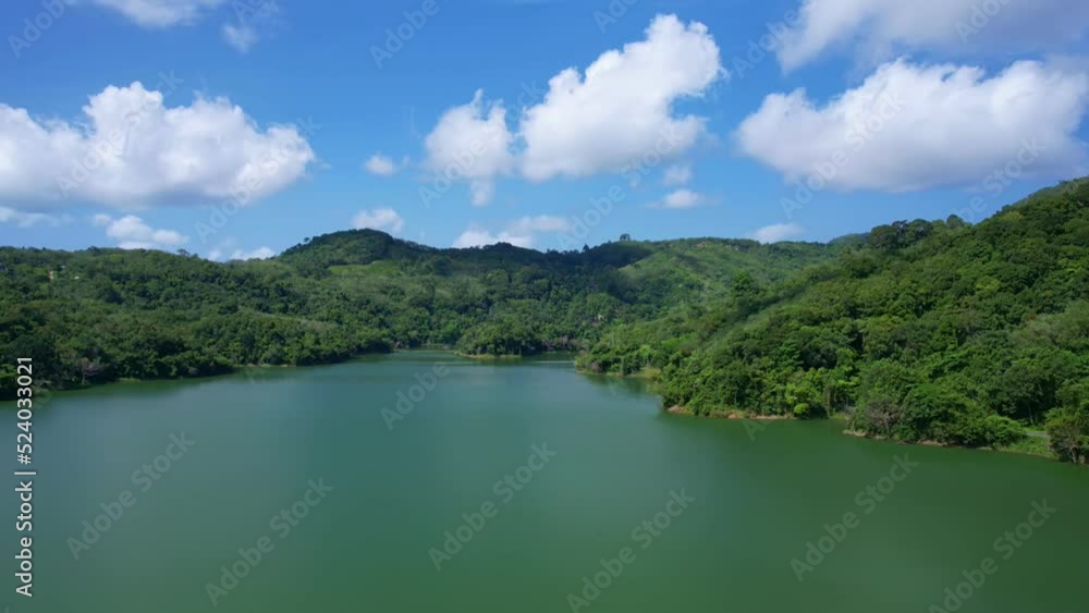 Aerial drone hyperlapse timelapse of beautiful valley between mountains lake.Amazing shadow clouds flowing over mountains lake. The rays of the sun hit the tree crowns beautiful nature landscape Aerial drone hyperlapse timelapse of beautiful valley between mountains lake.Amazing shadow clouds flowing over mountains lake. The rays of the sun hit the tree crowns beautiful nature landscape