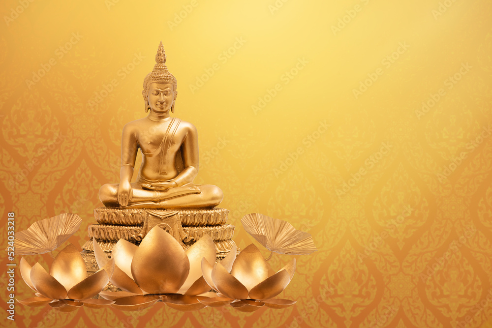 Buddha statue and lotus on gloden background.