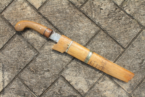 A machete is a large knife made of iron or steel that is used for cleaving or cutting. The machete is often used as a garden tool by the people of Indonesia