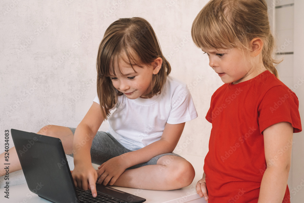 Happy children is learning online, playing or chatting with friends. Maybe they are looking for something interesting. Happy children is learning online, playing or chatting with friends. Maybe they are looking for something interesting.