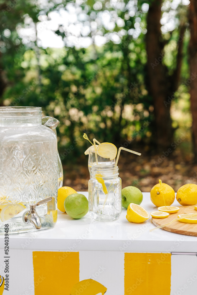 An empty lemonade stand ready for children to start selling lemonade on a hot summer day as