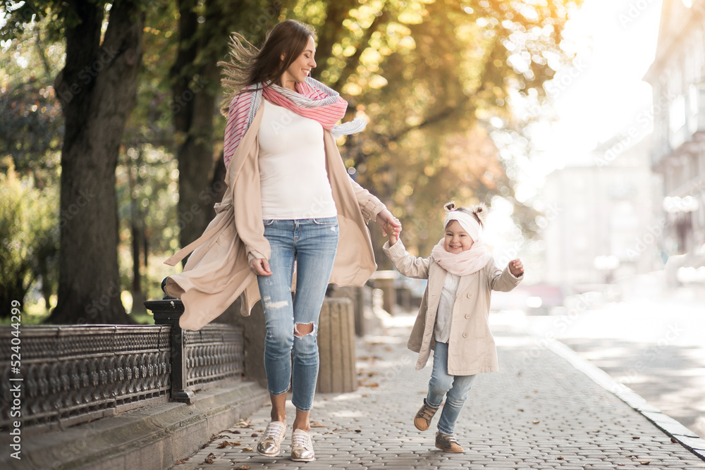 Fototapeta premium Mother with little daughter having fun together 