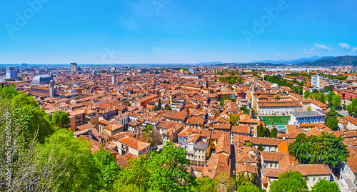 Brescia panorama with park of Cidneo Hill in the foreground, Italy photo