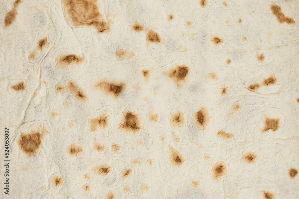 Texture of baked pita bread, top view