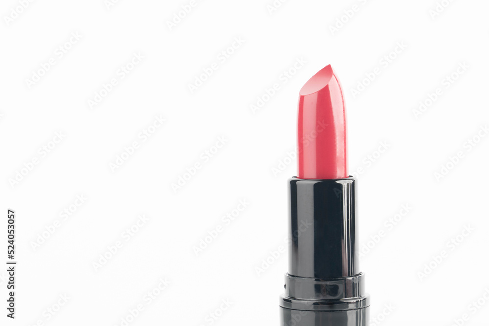 Red lipsticks in black tube package isolated on white background. Makeup and cosmetics concept. Close up. Red lipsticks in black tube package isolated on white background. Makeup and cosmetics concept. Close up.