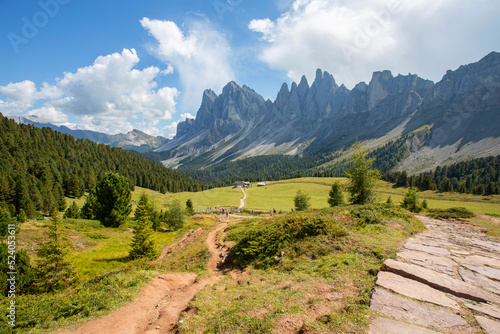 The Odle group (Geislergruppe) with Malga Brogles refuge on the background in Dolomites, South Tyrol, Italy. photo