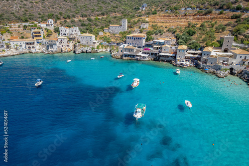 Aerial panoramic photo of Limeni the picturesque villlage with the turquoise waters and the stone buildings under Areopoli, peloponnese , Greece.