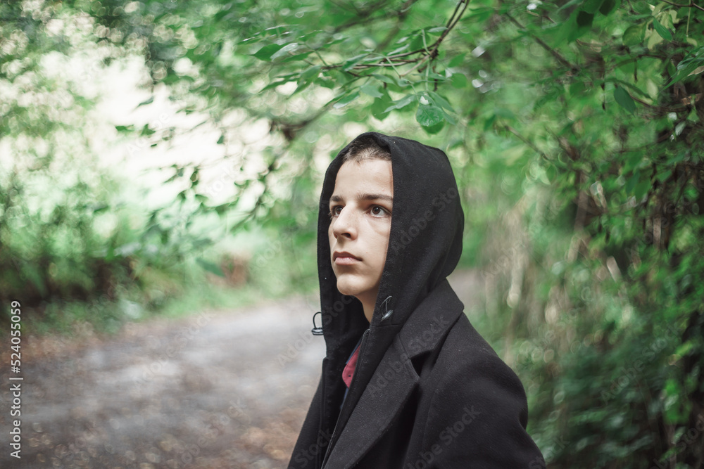 Portrait of a sad boy outside in nature Portrait of a sad boy outside in nature