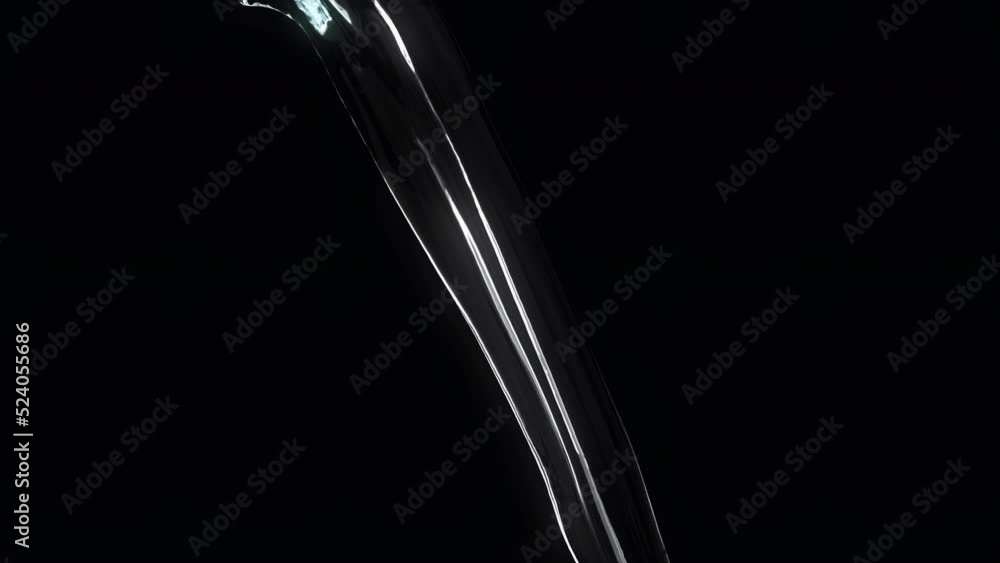 Super Slow motion closeup Pouring Water Liquid isolated on Black color background. 3D animation. 4K. Super Slow motion closeup Pouring Water Liquid isolated on Black color background. 3D animation. 4K.