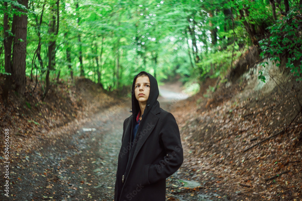 Portrait of a sad boy outside in nature Portrait of a sad boy outside in nature