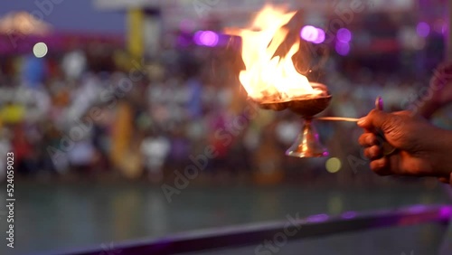Performing ganga aarti with a lamp haridwar photo