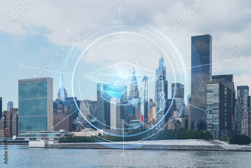 New York City skyline, United Nation headquarters over the East River, Manhattan, Midtown at day time, NYC, USA. Technologies and education concept. Academic research, top ranking university, hologram