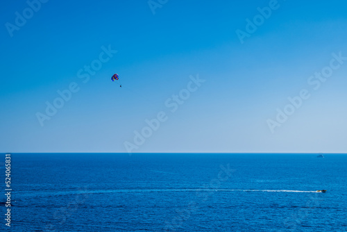 Parasailing above sea in Mediterranean Turkey,  Copy space, holiday fun activities.
