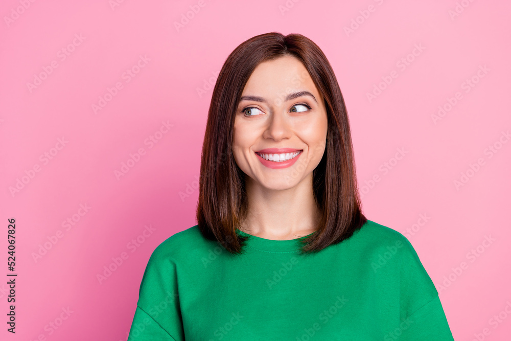 Closeup photo of young beautiful cute lady looking empty space smiling advertisement isolated on pink color background Closeup photo of young beautiful cute lady looking empty space smiling advertisement isolated on pink color background