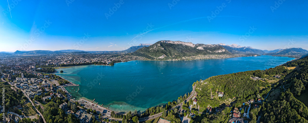Aerial view above the Lac de Annecy during summertime canicule in the French Alps